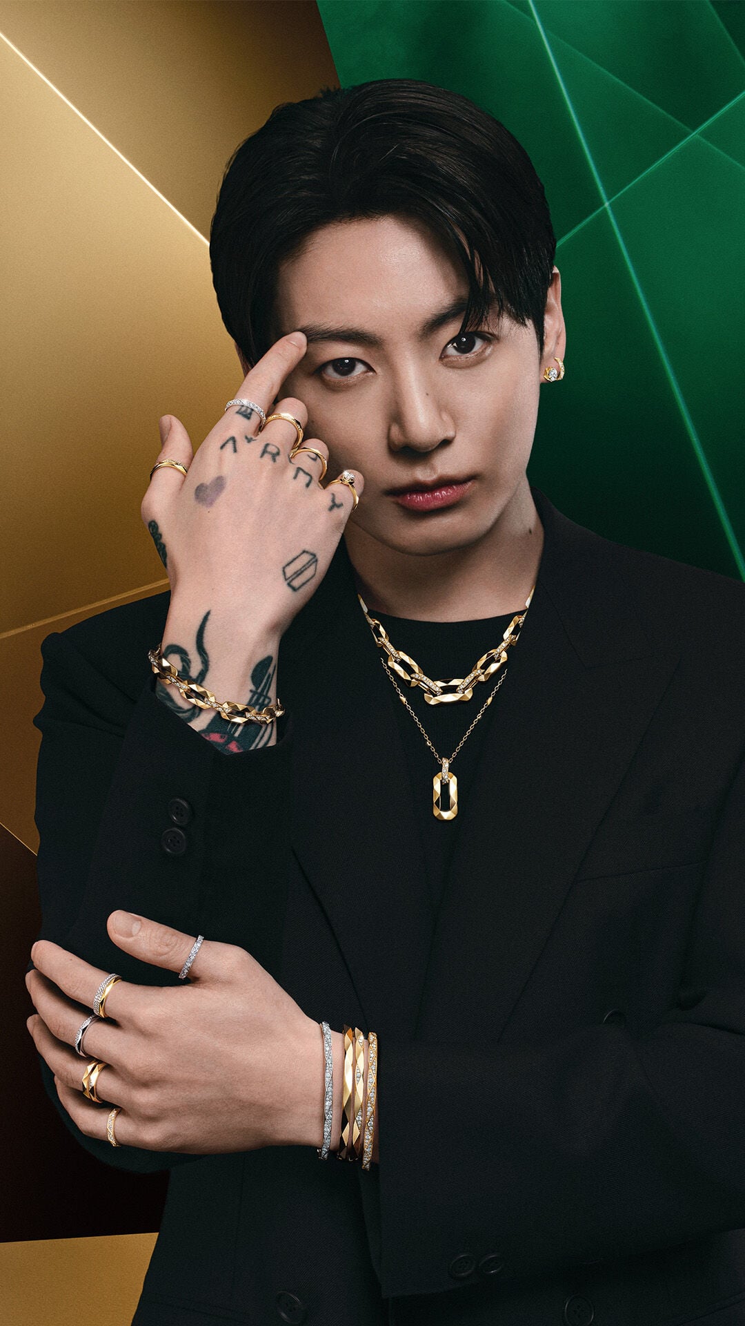 Image shows Graff brand ambassador Jung Kook wearing Laurence Graff Signature collection jewellery